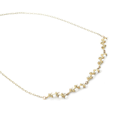 Pearl rice necklace by Michael Michaud