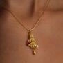 Ruby and pearl clown necklace by Ruby Jack