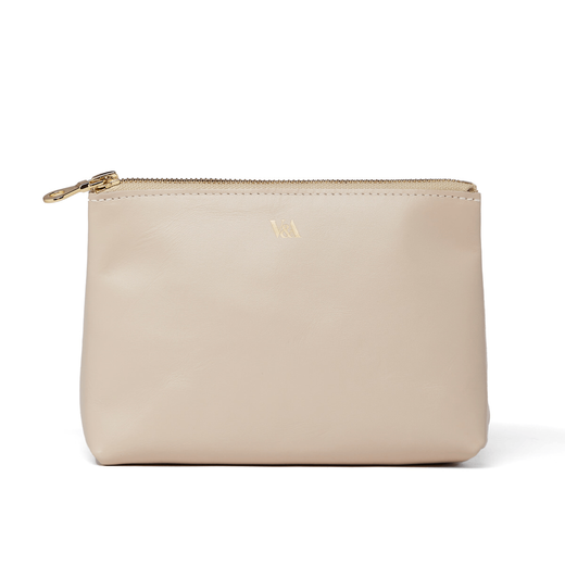 Beige leather pouch with a gold zip and V&A logo.