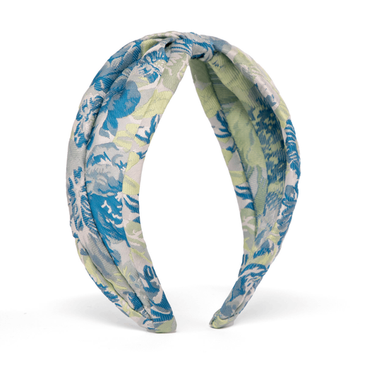 Fabric headband featuring a blue floral pattern.
