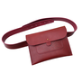 Red leather crossbody bag with leather strap and embossed floral details.