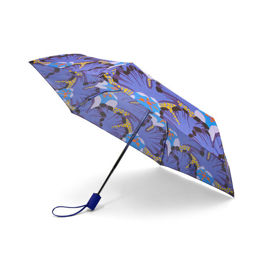 An open umbrella with a purple floral pattern.