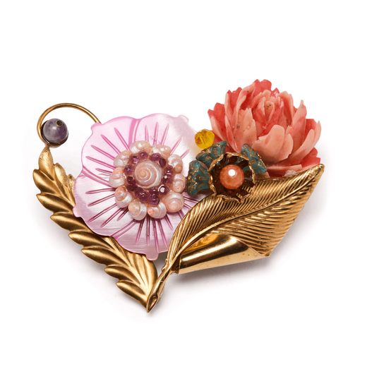 Pink and gold brooch with flower shaped mother-of-pearl and vintage stones.