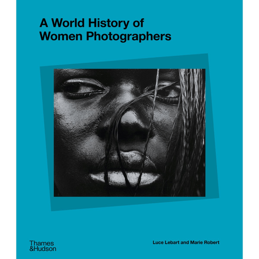 A blue book cover with a black and white portrait photography in the centre. 