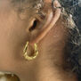 Mini twisted hoop earrings by Hoops & Chains