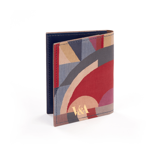 Leather card wallet with a red, cream and dusty blue pattern.