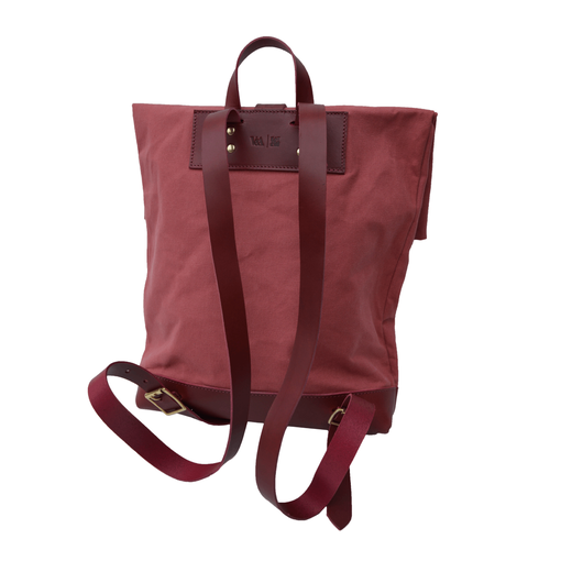 Red embossed backpack by Natthakur