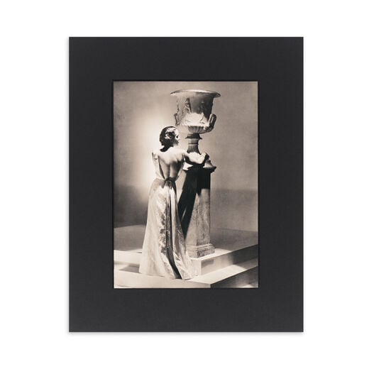 Print with black mount featuring a vintage black and white photograph taken by George Hoyningen. 