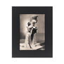 Print with black mount featuring a vintage black and white photograph taken by George Hoyningen. 