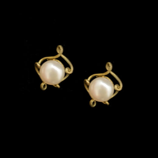 Pearl stud earrings by Michael Michaud