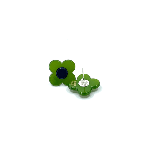 A pair of flower shaped stud earrings with a blue centre and green petals. One earring is laid upside down to show the back.