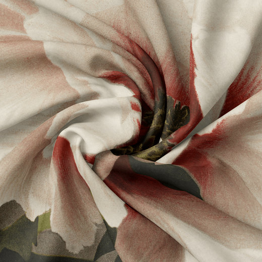 A detail of a scarf featuring a pale pink peony, wrapped in the centre.