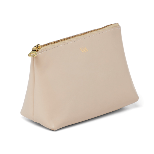 Beige leather pouch with a gold zip and V&A logo, seen from the side.