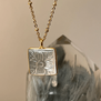 Carved rock crystal pendant necklace by Mirabelle