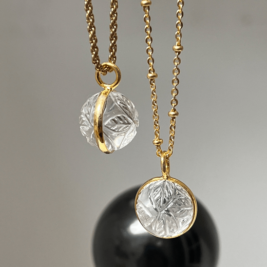 Carved quartz pendant necklace by Mirabelle
