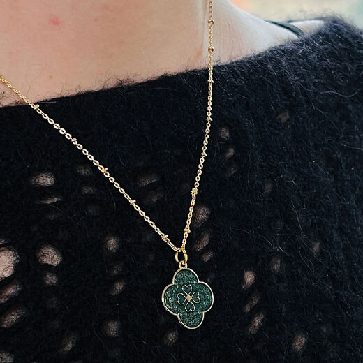 Green enamel petal pendant necklace by Mirabelle