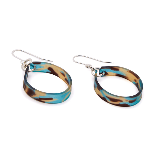 A pair of hook earrings featuring acetate hoops in shades of blue and brown.