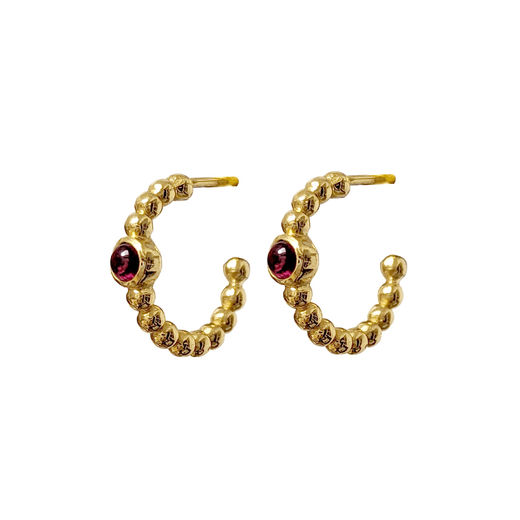 Gold hoop earrings with a central round red stones.