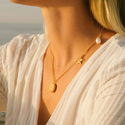 Dark blue zirconia and pearl sea charm necklace by Ottoman Hands