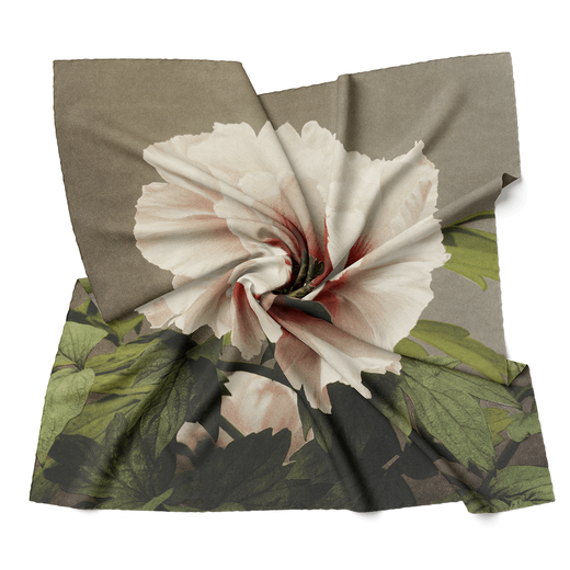 Square shaped scarf featuring a pale pink peony, slightly wrapped.