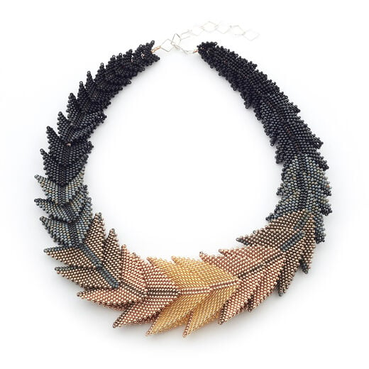Gold and black statement necklace by Beloved Beadwork