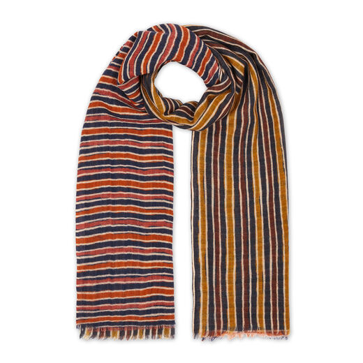 Striped orange, red and blue wool scarf, wrapped.