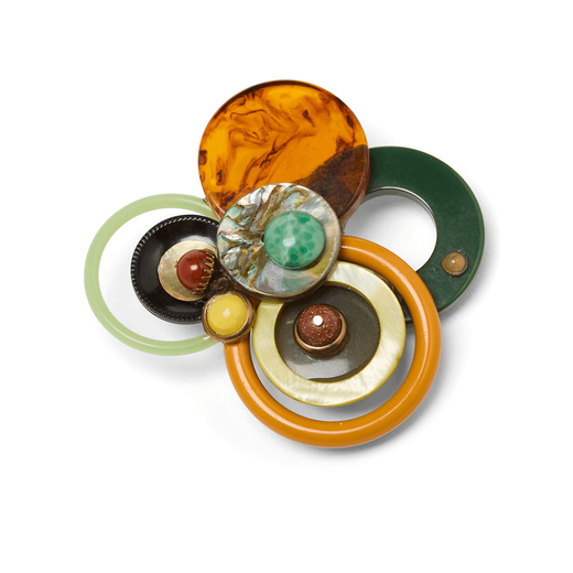 Brooch made with brown, orange, and green beads and vintage glass.