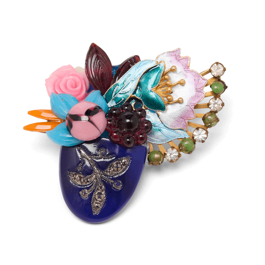 A vase shaped, multicoloured brooch with blue, pink, and turquoise stones.