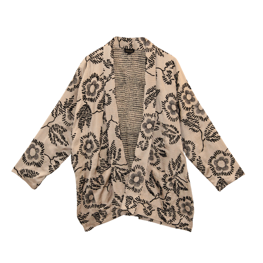 Long sleeve jacket featuring a floral black pattern on a cream background.