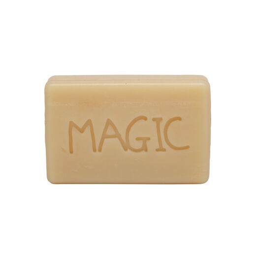 A soap bar with the word MAGIC spelled out in capital letters.