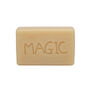 A soap bar with the word MAGIC spelled out in capital letters.