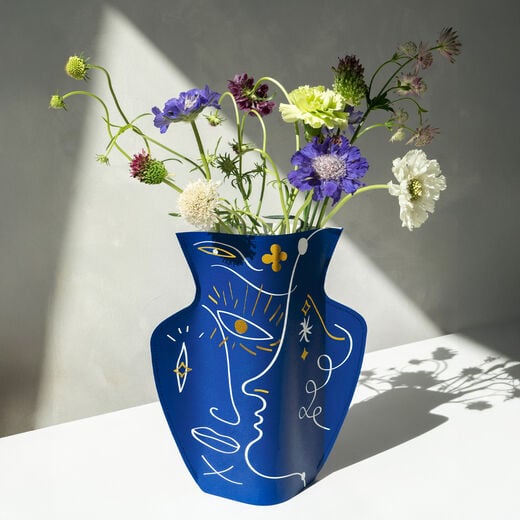 Abstract face paper vase