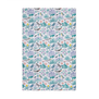 Tea towel with a pattern of birds and flowers in muted colours on white background.  