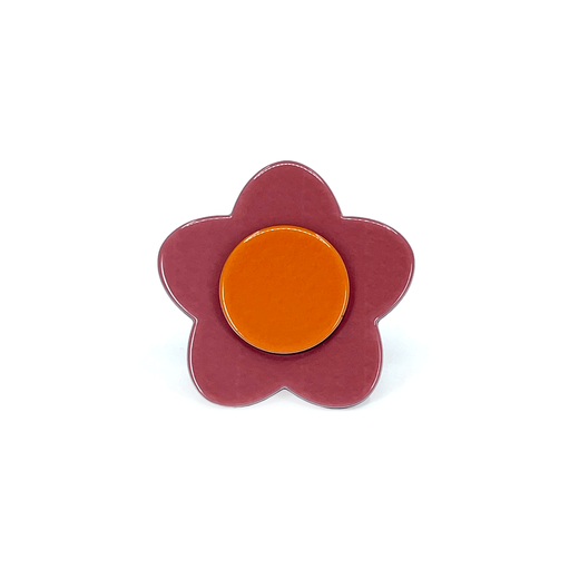 A pink and orange flower shaped ring.
