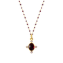 Gold chain rosary necklace with a red stone oval pendant surrounded by four small amethysts.
