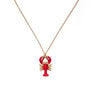 red lobster pendant on delicate golden necklace