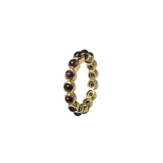 Gold ring with red garnets.