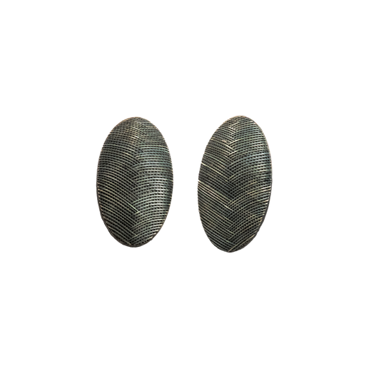 A pair of oval shaped earrings with a dark woven texture.