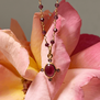 Garnet and amethyst pendant necklace by Mirabelle
