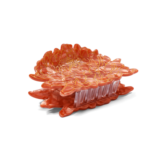 Hair clip in the shape of a coral chrysanthemum. Side view. 
