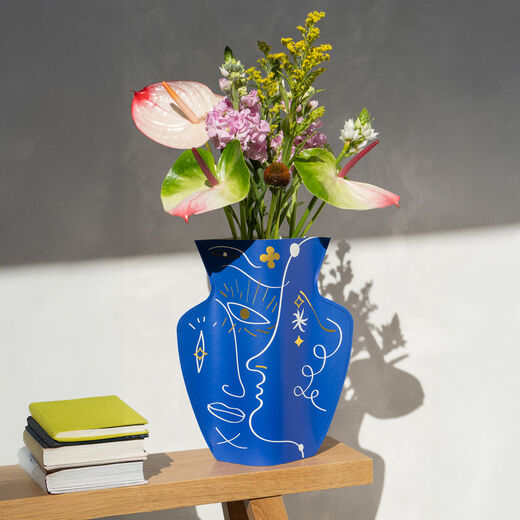 Abstract face paper vase
