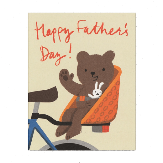 Greeting card featuring an illustration of a brown bear on a bike and the message 'Happy Father's Day' in red.