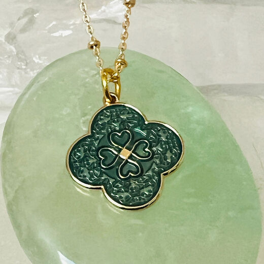 Green enamel petal pendant necklace by Mirabelle