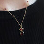 Red onyx and garnet pendant necklace by Mirabelle