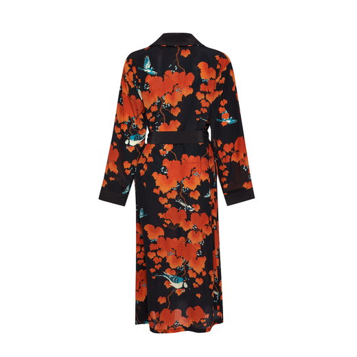 Back view of a long black dressing gown with a red foliage pattern.