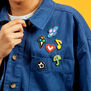 Heart-shaped enamel badge