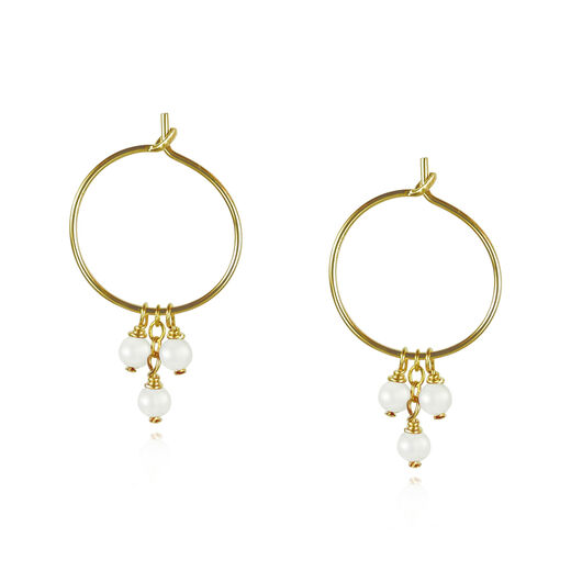 Pearl hoop earrings by Mounir
