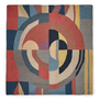 Square silk scarf with a dusty blue, red and yellow geometric pattern.