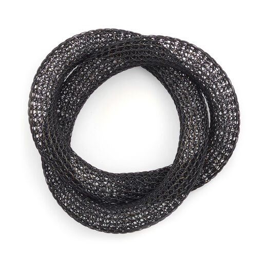 Black knotted bangle by Sarah Cavender