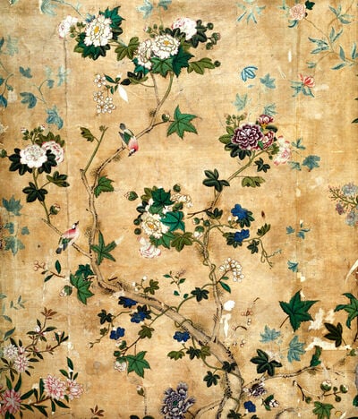 Wallpaper with climbing flowering plant on gold background